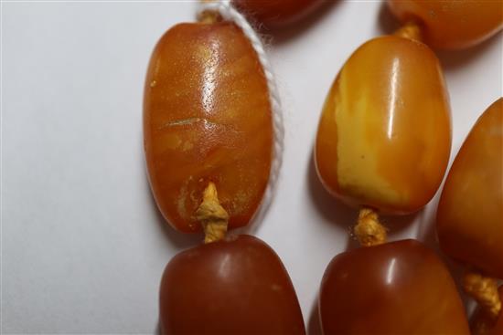 A single strand amber bead necklace, gross weight 48 grams, 57cm.